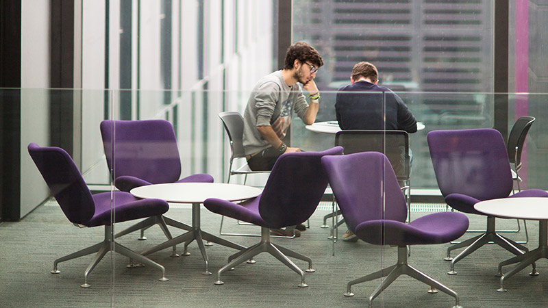 Two male students studying in a quiet space